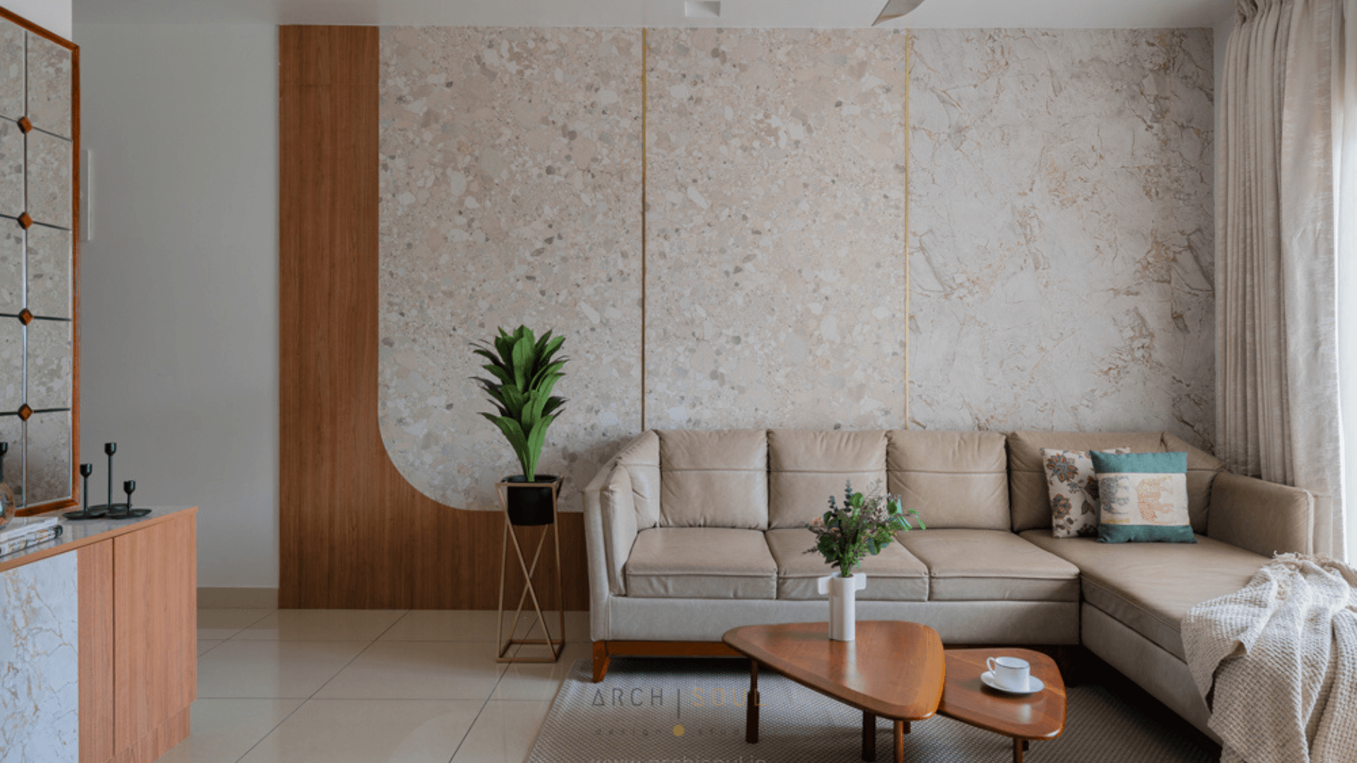 A cozy living room featuring a couch, and a coffee table
